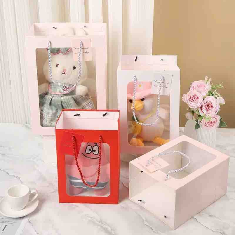 Ukrasna papirna poklon kesa s prozorom 16x20x30 cm (paket 12 kom)